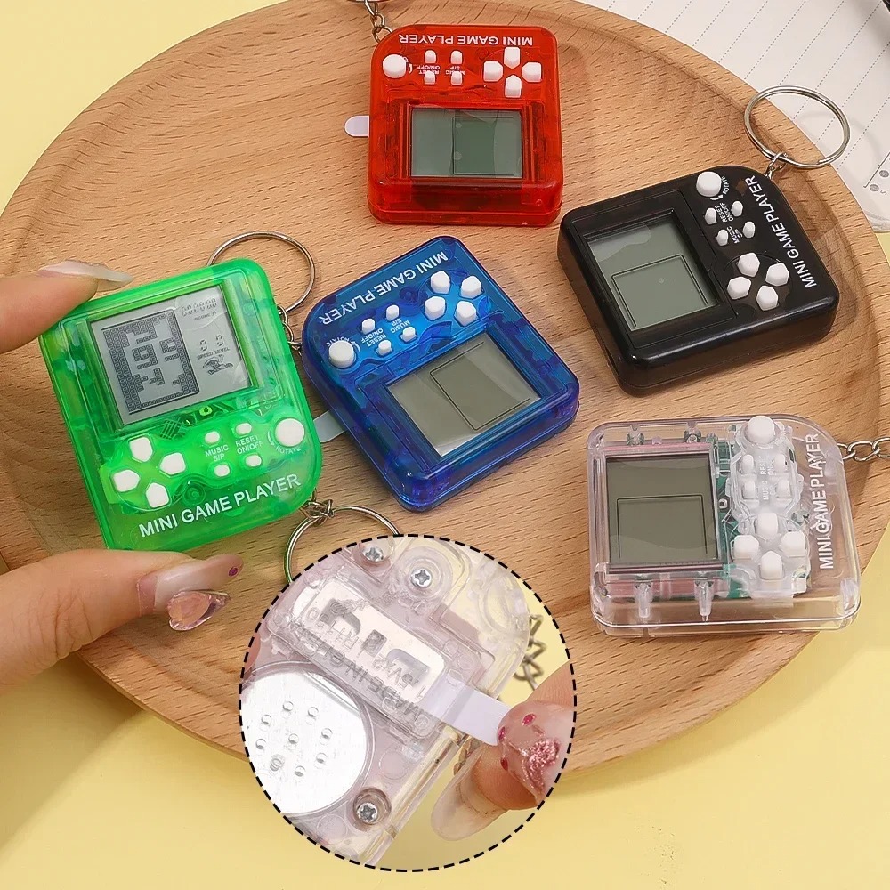 Portable Mini Handheld Game Pl - огляд і ціна Gaming Console Keychain