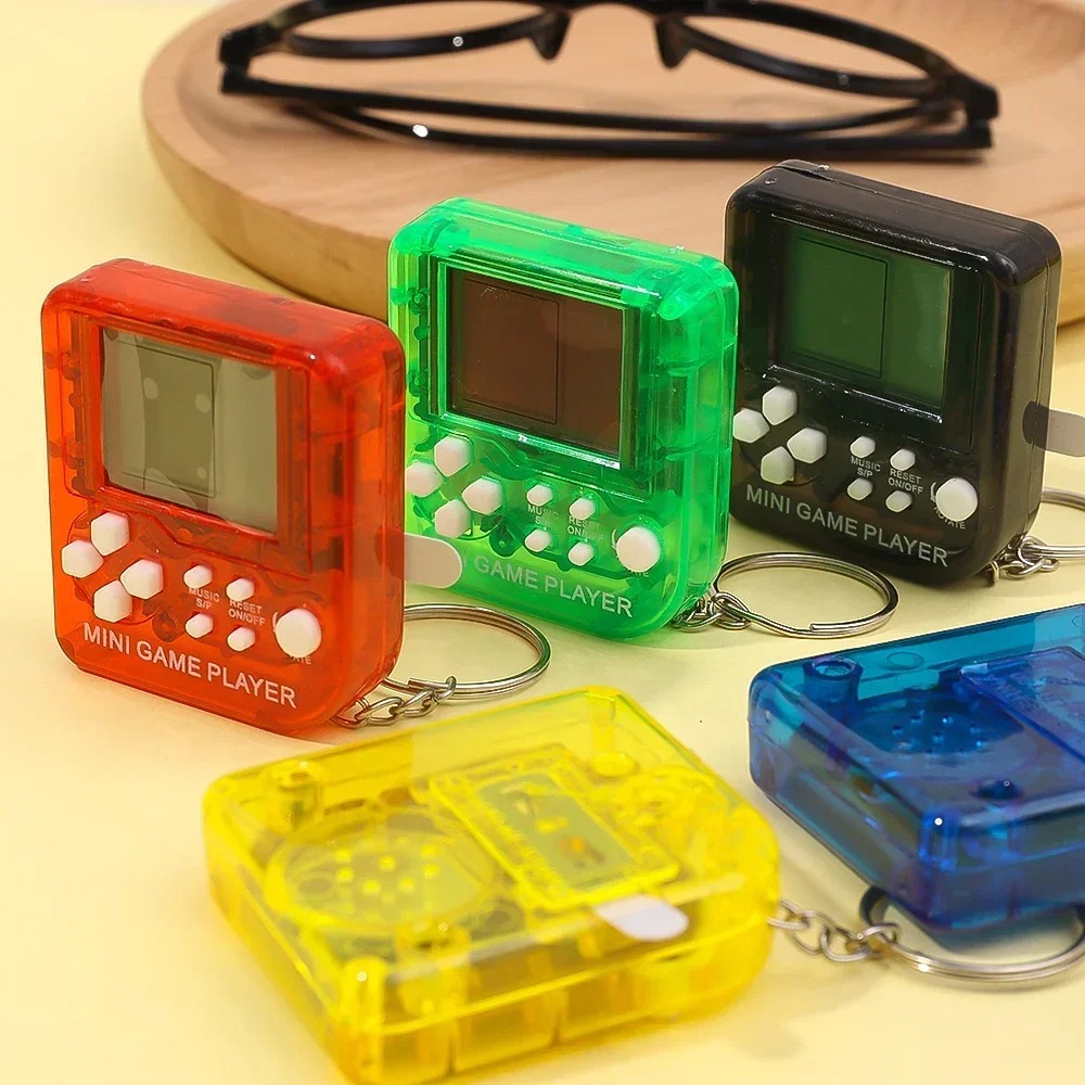 Portable Mini Handheld Game Pl - огляд і ціна Gaming Console Keychain